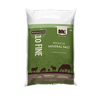 A 25-pound bag and 5-pound pouch of Redmond 10 Fine loose mineral salt for cows.